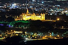 Mysore Palace seen from Chamundi Hill Viewpoint at night