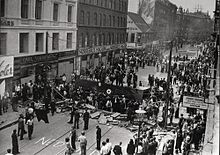 Barricades erected during a general strike, Norrebro, Copenhagen, July 1944. Norrebro Riot.jpg