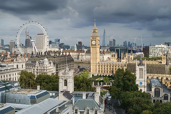 London skyline with Big Ben and environs, including the London Eye, Portcullis House, Parliament Square, and St Margaret's Church.