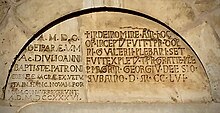 Pieve di San Giovanni Battista, iscrizione del 1256 incastonata nel portale che commemora la costruzione della stessa: In nomine Domini Amen. Hoc opus inceptum fuit tempore D. Gualtieri plebani et expletum tempore D. Gratie plebani per magistrum Georgium de esio sub A.D. MCCLVI.