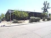 Side view of the Vlassis Ruzow and Associates Building which was built in 1974. It is located at 1545 W. Thomas Road. The structure is listed in the National Register of Historic Places on April 12, 2007, reference #07000279, as part of the Margarita Historic District.