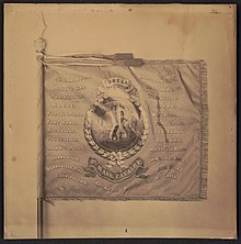 Regimental flag of Co. A, 2nd Massachusetts Cavalry Regiment. From the Liljenquist Family Collection of Civil War Photographs, Prints and Photographs Division, Library of Congress Regt. flag of the 2d Mass. Cavalry, Benjamin Locke, Sgt., A Company LCCN2016646225.jpg