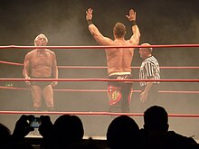 Flair wrestling Douglas Williams in the main event of TNA's Maximum Wooo! tour of Europe Ric Flair vs. Douglas Williams.jpg