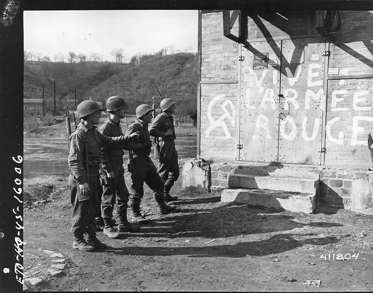 File:SC 411804 - Members of the 9th Armored Division, 3rd U.S. Army looking at a sign about the Russian army. 25 February, 1945. Sprimont, Belgium. (49537747038).jpg