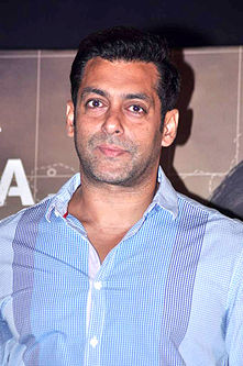 A photograph of Salman Khan, looking away from the camera.