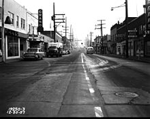 Looking east on 85th Street in the Greenwood neighborhood from Palatine in 1957. The Grand cinema is now (2013) the Taproot Theatre. Seattle - 85th and Palatine, 1957.jpg