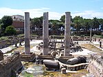 Ancient ruins with three standing columns