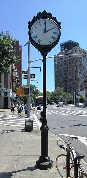 Sidewalk clock on Flatbush Avenue