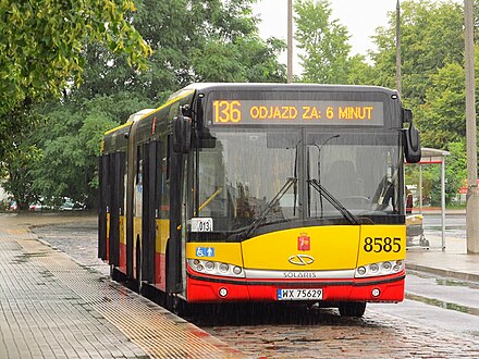 City buses are painted red and yellow