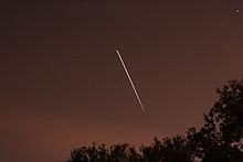 Atlantis docked with the ISS moving southeast across the skies of Tampa, Florida SpaceStation STS132 Tampa.JPG