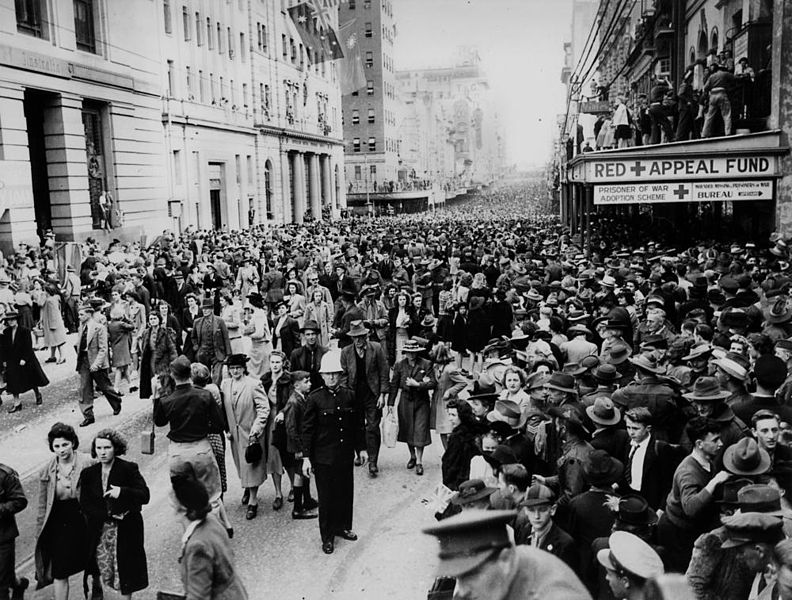 File:StateLibQld 1 116104 Crowds in the street after the march of the Seventh Division troops through Brisbane, 1944.jpg