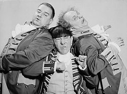 Larry, Moe, and Curly Joe: The Stooges with Curly Joe DeRita (left) in 1959 Three Stooges 1959.jpg