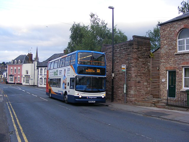 TransBus Trident ALX400 on service 32 to Gloucester at Five Ways, Ross-on-Wye adjacent to the bridge abutment which carried the railway through the to