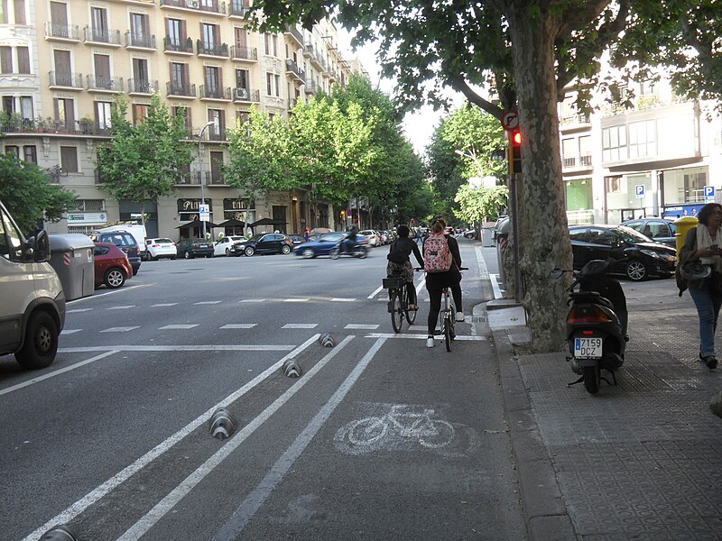 File:Two eras of bike lane stencil (18360246068).jpg