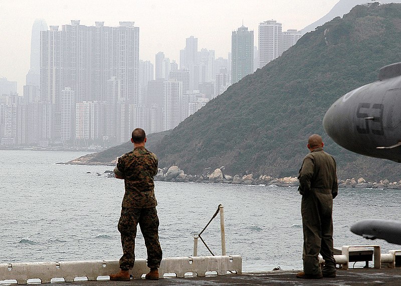 File:US Navy 060125-N-2256V-002 Marines aboard the amphibious assault ship USS Tarawa (LHA 1) observes the sites of Hong Kong, as the ship prepares to make a port call.jpg