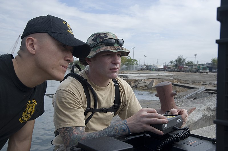 File:US Navy 100119-N-1134L-035 Capt. Scott Sann, commander of the 544th Engineer Dive Team, left, and Army diver Staff Sgt. William D'Angelo operate a remotely operated vehicle.jpg