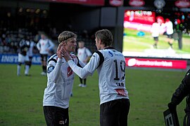 Soccer players Ulrik and Tore André Flo.