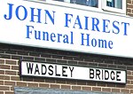 Old station sign at John Fairest Funeral Home.