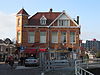 Twee woon-winkelhuizen in Jugendstil