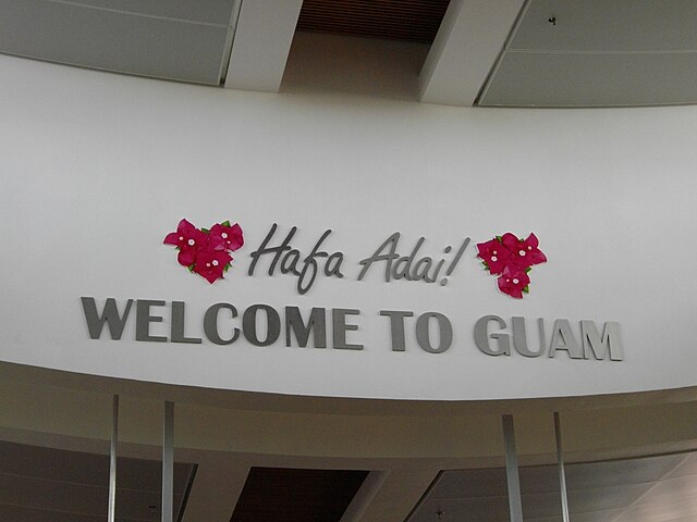 The common greeting "Hafa Adai" at Antonio B. Won Pat International Airport on Guam. "Hafa" here is not written as "Håfa" as in the newer, standardise