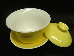 A porcelain gaiwan, lid removed