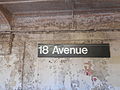 A sign along one of the platforms of the 18th Avenue (BMT Sea Beach Line) station...