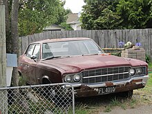 One of only 12 NZ-delivered 1970 Ambassadors, rusting in a backyard in Christchurch at the time of this photo 1970 AMC Ambassador (6989269159).jpg