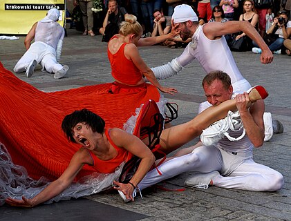Cracow Dance Theatre enacts a fight between men and women in the performance "Estra & Andro" at 29. ULICA – The International Festival of Street Theatres in Cracow