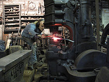 An Artist Blacksmith working with a power hammer in Bodom, Finland, 2011 4 artist blacksmith forging with power hammer.JPG