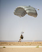 A U.S. Marine with the 26th Marine Expeditionary Unit's Maritime Raid Force descends to a landing zone during parachute operations at King Faisal Air Base in Jordan June 12, 2013, during exercise Eager Lion 130612-M-SO289-004.jpg