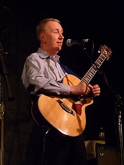 Scottish singer Al Stewart (pictured in 2010) spent the final eight weeks of 1978 at number one with "Time Passages", the longest run of the year. Al Stewart performing, McCabe's Guitar Shop, Santa Monica, California (Feb. 2010).jpg