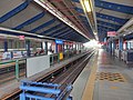 A platform view of the Bangsar station (night).