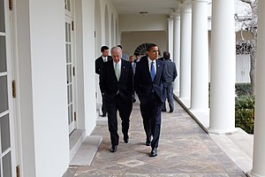 English: President Barack Obama walking with V...