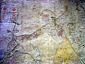Рамсес II в повязке хат, сокрушающий врагов. Фреска из храма Бейт эль-Вали. Нубия.
