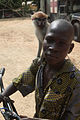 Boy and pet monkey at Bembèrèkè 2009-06-15