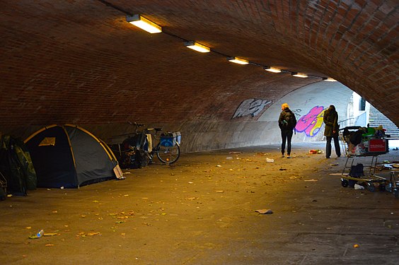 Underpass in Berlin with tent of homeless