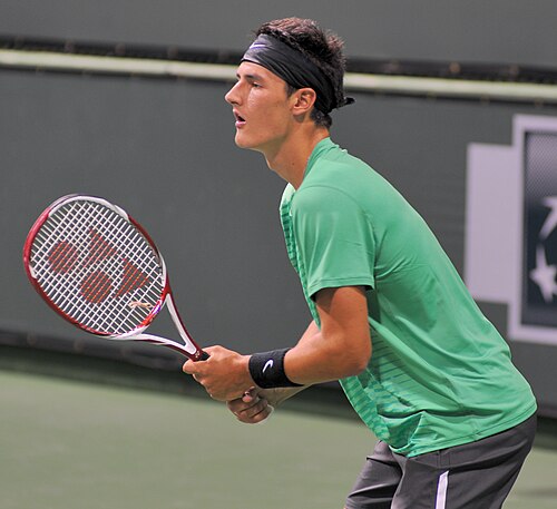 Tomic competing at the 2012 BNP Paribas Open.