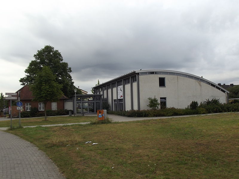 File:Bicycle station Steinfurt connected to old house.jpg