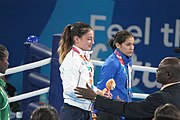 Deutsch: Boxen bei den Olympischen Jugendspielen 2018 Tag 12, 18. Oktober 2018 - Medaillenzeremonie im Fliegengewicht der Mädchen - Gold: Martina La Piana (Italien), Silber: Adijat Gbadamosi (Nigeria), Bronze: Heaven Destiny Garcia (USA); Medaillenübergabe durch Habu Gumel (IOC, Nigeria), Geschenkübergabe durch Dr. Joseph O. Ayeni (Nigeria, AIBA). English: Boxing at the 2018 Summer Youth Olympics on 18 October 2018 – Girl's flyweight Medal Ceremony - Gold: Martina La Piana (Italy), Silver: Adijat Gbadamosi (Nigeria), Bronze: Heaven Destiny Garcia (USA); Medal handover by Habu Gumel (IOC, Nigeria), Gift presented by Dr. Joseph O. Ayeni (Nigeria, AIBA). Español: Boxeo en los Juegos Olímpicos Juveniles de Verano de 2018 en 18 de octubre de 2018 - Ceremonia de la Medalla de peso mosca para niñas - Oro: Martina La Piana (Italia), Plata: Adijat Gbadamosi (Nigeria), Bronce: Heaven Destiny Garcia (Estados Unidos); Entrega de medallas por Habu Gumel (COI, Nigeria), Regalo presentado por Joseph O. Ayeni (Nigeria, AIBA).