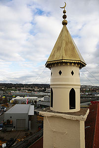 The mock minaret on the roof of Pump it up in Bussigny, erected in response to the Minaret controversy in Switzerland