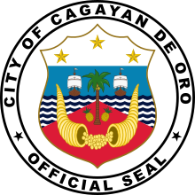 The seal of Cagayan de Oro when it attained its cityhood in 1950 and was replaced in 1976. The 1976 seal was revised in 1990 to reflect the status of the city as a highly urbanized city independent of the province, but it was later replaced on the 50th anniversary of cityhood in 2000 with a newer seal. In 2014, the 1990 seal was readopted contrary to recommendations of local historians to readopt the 1950 seal which was recognized as the seal of the city by NHCP. The non-registration of the 1990 seal to NHCP left its legality open to question. Cagayan de Oro Seal 1950-1976.svg