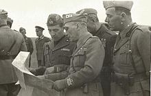 General Bruno Malaguti, Chief of Staff of the 8th Army (ARMIR), and Italian officers intently study a map during the invasion of Russia, 1942 Campagna di Russia Armir.jpg