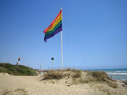 The rainbow flag flies in Capocotta, near Rome, Lazio, a gay-friendly beach on the Italian Mediterranean Sea