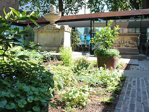 The Sackler Garden, designed by Dan Pearson as part of the redevelopment project. It contains the tombs of Vice-Admiral of the Blue William Bligh (left) and the Tradescants (right)