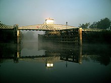 Cawood swing-bridge, crossing over the River Ouse Cawood bridge, river Ouse at sunrise - geograph.org.uk - 1257218.jpg