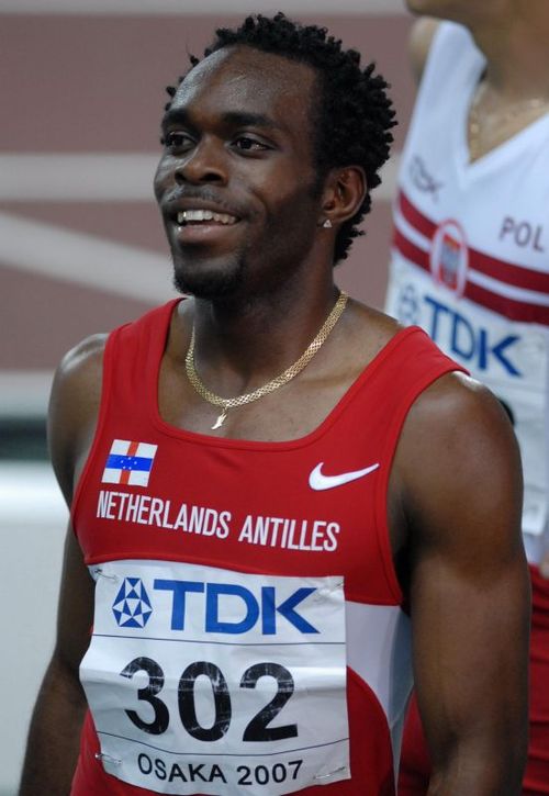 Churandy Martina propelled the Netherlands Antilles to eighth in the table.
