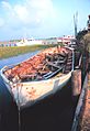 A ship's derelict lifeboat, built of steel, rusting away in the wetlands of Folly Island, South Carolina, United States