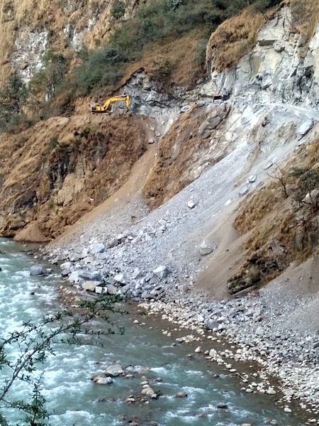File:Dumping of Debris into the Gori Ganga River 2.jpg