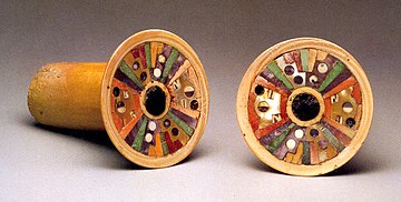 Wari earflare pair -- bone, ivory and semi-precious stones. A famous artifact from the Metropolitan Museum of Art. Earflare MET vs1978 412 215 216.jpg