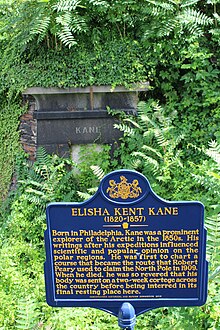 Kane's hillside tomb and historical plaque in Laurel Hill Cemetery